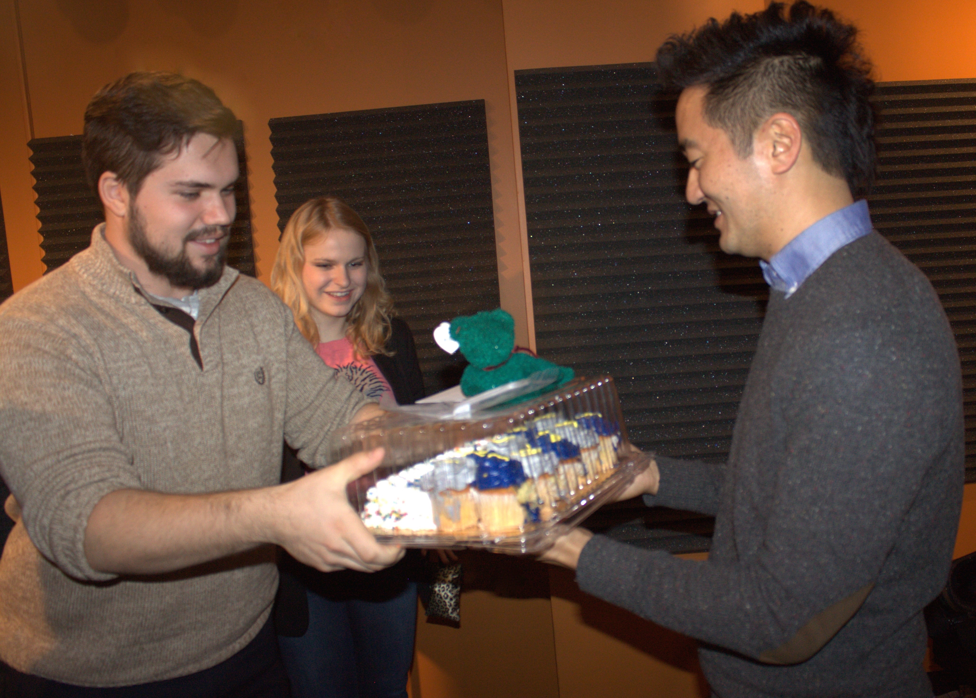 Host Will Doran hands over some Kishi Bashi themed cupcakes. Fortunately he claimed to be on a diet, so WRVU still got to eat them.